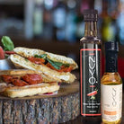 Fused Spicy Serrano Pepper Olive Oil paired with White Peach Balsamic Vinegar - Nuvo Olive Oil